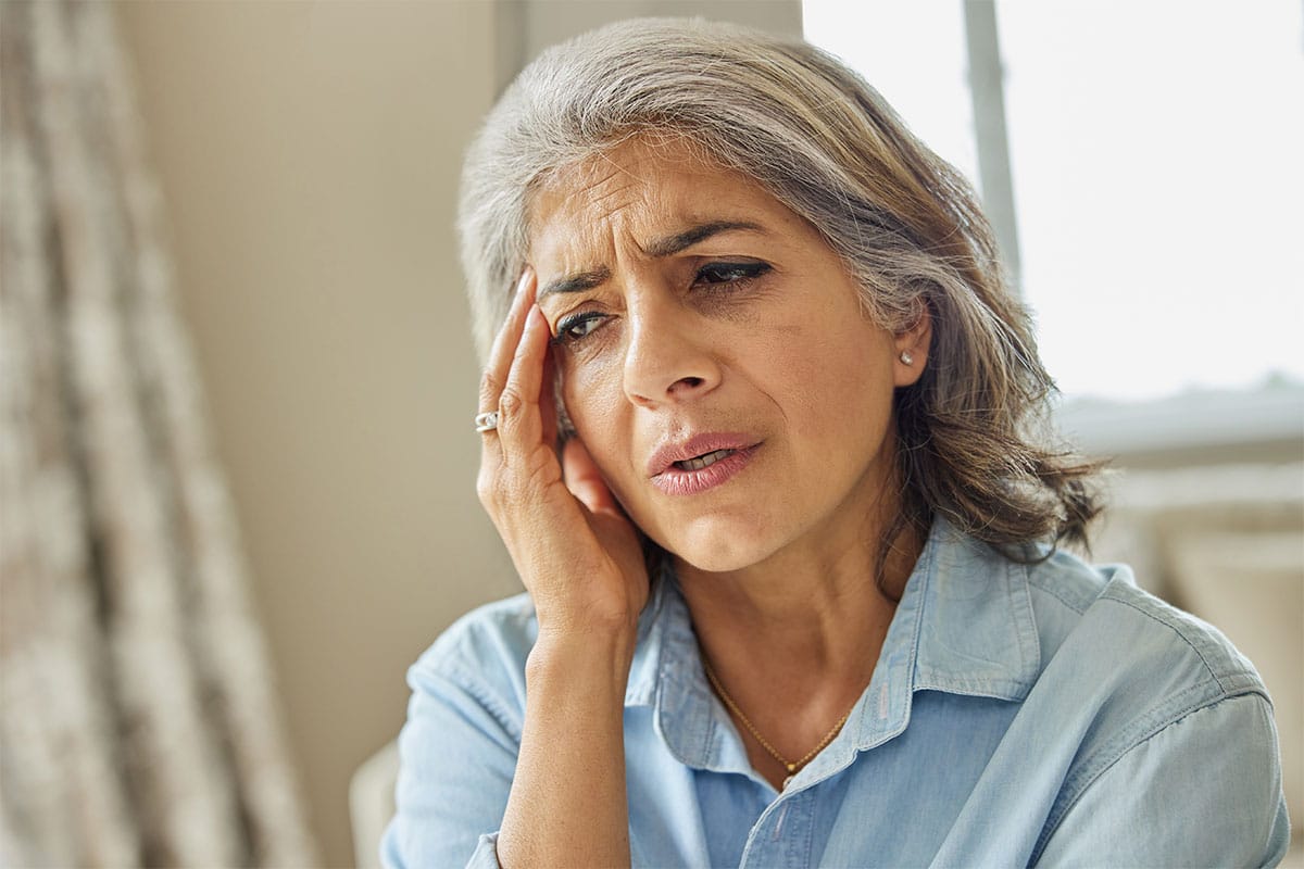 Sleep and dementia - What's the link? Woman experiencing sleep deprivation